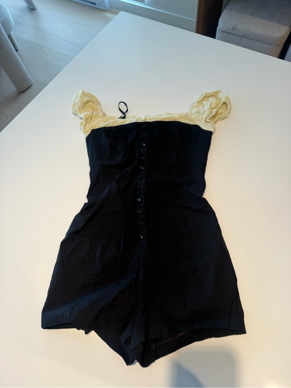 AnthropologyBlack Romper with baby yPuff Sleeves - Women's